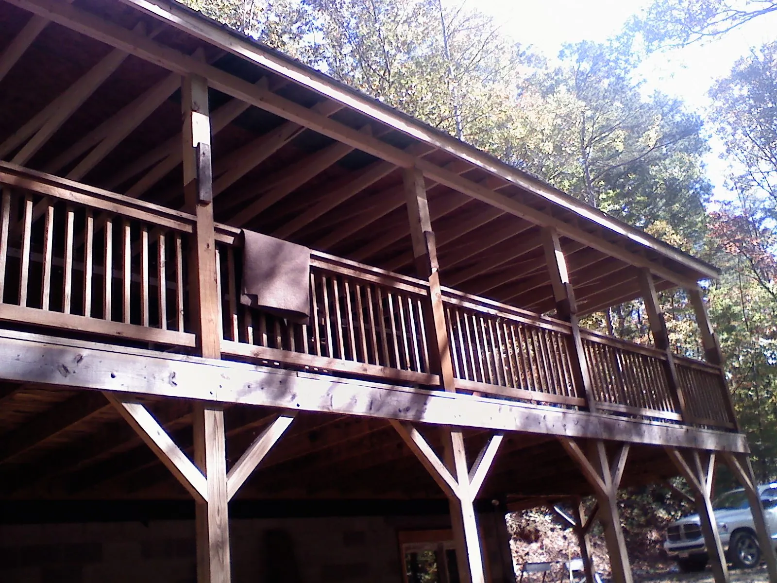 Timber framing under a new elevated porch and deck — Roof Leak Repair in Powderly by Roofing Brothers